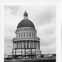 Exterior view of the California State Capitol dome. This view shows the progress of the annex construction