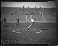 Glenn "Tiny" Hartranft participating in the discus throw at the Coliseum, Los Angeles, 1922-1927