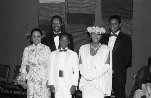 Bishop Charles E. Blake, Sr. posing with family at his Inaugural Banquet, Los Angeles, 1986