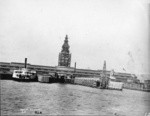 [Ferry Building during reconstruction. As seen from approach to slips in San Francisco Bay]