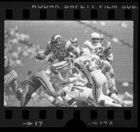 Wendell Tyler clearing tackle during Los Angeles Rams vs St. Louis Cardinals game, 1979