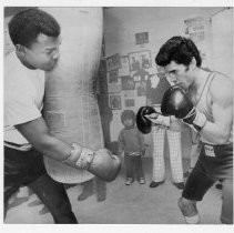 Joe Guevara (right), Boxer