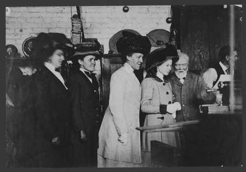 Mrs. Louise Whitfield Carnegie, Margaret Carnegie, Evelina Conklin Hale, Margaret Hale, and Andrew Carnegie at the machine shop, Pasadena