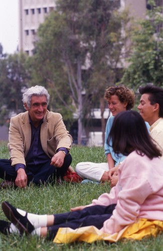 Professor Frank Cancian with students in Aldrich (campus) park.
