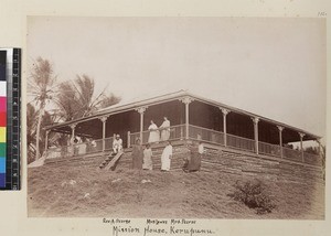 View of group outside mission house, Kerepunu, Papua New Guinea, ca. 1890