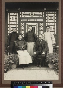 Group portrait of missionary with Chinese colleagues, Beijing, China, ca. 1920/1930