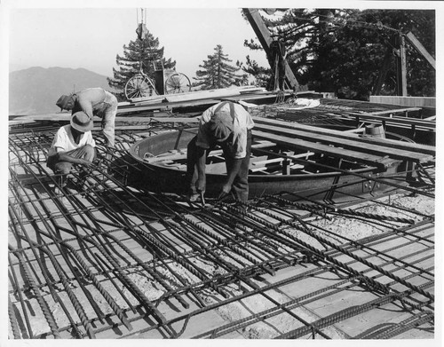 Installation of steel reinforcing rods for the concrete floor of the foundation for the Hooker telescope building, Mount Wilson Observatory
