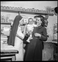 Lisieux. R.C. with mother and baby [Red Cross. Refugees. Lisieux, France]