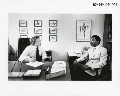 Jerrold Novotney with Terry Spearman in his office, circa 1979