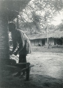 Musician playing Nkful, in Gabon