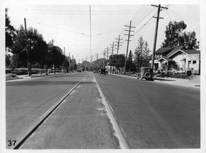 View of Glendale Avenue, Glendale, showing ragged pavement along U.P. rails south of Colorado Street, Los Angeles County, 1926