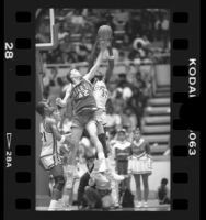 Basketball players Stephen Thompson battling Tom Peabody in Crenshaw High School vs Mater Dei game in Los Angeles, Calif., 1986