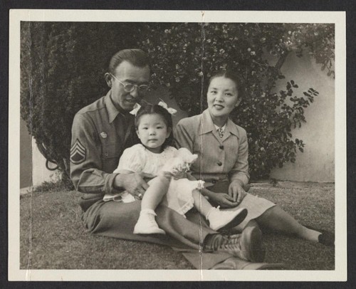 The Day Aki returned from War, 1945 or 6; Aki, Suga Ann, Saku at home of Dr. Henry Takahashi on Blake Street, Berkeley