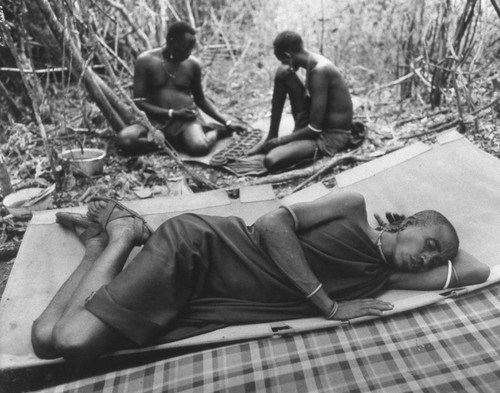 Villager sleeping on a cot, Tanzania, 1979