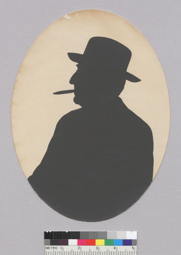 Waist length silhouette of man wearing hat and smoking cigar, Bohemian Grove. [photographic print]