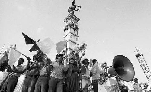 Supporters of José Napoleón Duarte cheer at a rally, San Salvador, 1982