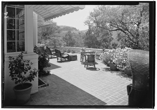 Loy, Myrna, and Arthur Hornblow, residence. Outdoor living space