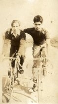Two cyclists posing on track