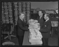 David R. Faries and D. V. Nicholson present petitions to County Registrar of Voters William M. Kerr, Los Angeles, 1935