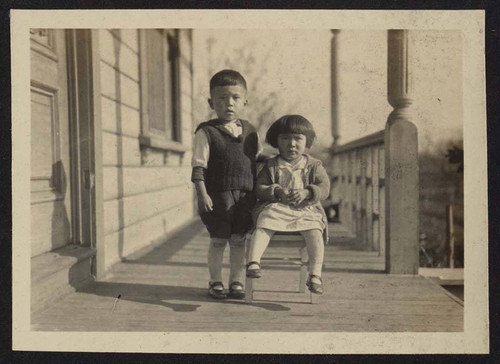Boy and girl on porch