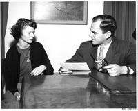 Two people sitting at a table