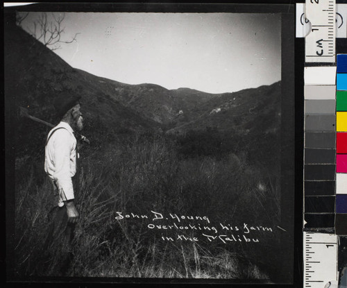 John D. Young overlooking his farm in the Malibu