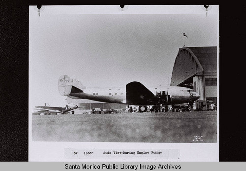 Side view during an engine run-up of a Douglas DC-4 outside the hangar, Clover Field, Santa Monica, Calif. on June 16, 1938