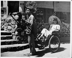 Getting a ricsha ride, Chinatown in 1948