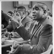 Sonny Liston at a hearing of the California State Athletic Commission, with Charles Lloyd
