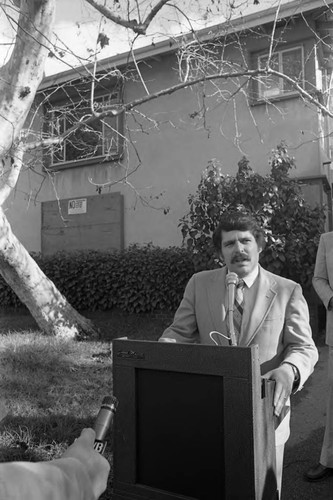 Zev Yaroslavsky speaking at an outdoor lectern, Los Angeles, 1981