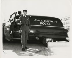Joseph Connolly and campus police vehicle