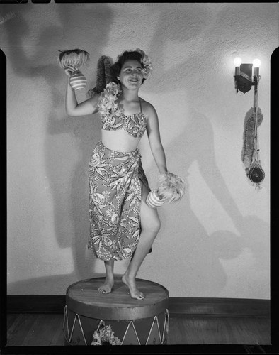 Young woman dancing Polynesian-style costume, 1951