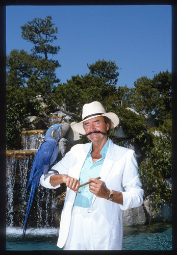 Leroy Neiman with parrot and cigar