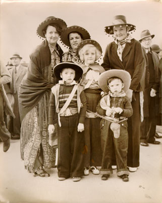[Group of people dressed up for the Golden Gate Bridge Fiesta on Pedestrian Day]