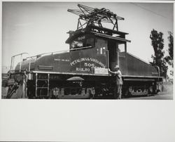 Ray Pelton and the number 506 freight motor of the Petaluma and Santa Rosa Railroad, Petaluma, California, 1930?