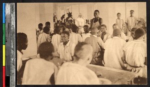 Workers sitting in a refectory, Kakyelo, Congo, ca.1920-1940