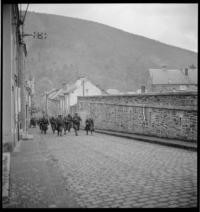 Soldiers: Miscellaneous [Soldiers walking through village]