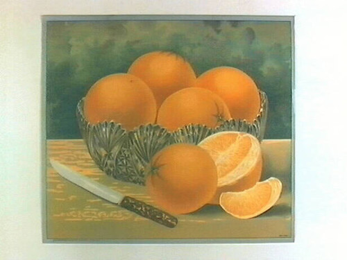 Stock label: glass bowl of oranges and peeled orange slices with knife