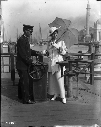 Miss Gloria Heating on a ship with the purser. Second image