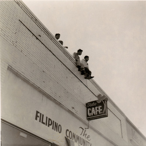Filipino Men Atop of the Filipino Community Center on 425 State Street in Santa Barbara, CA