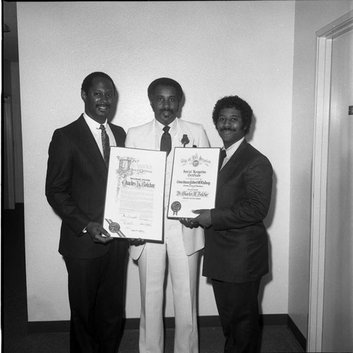 Dr. Charles H. Belcher receiving commendations from the city, Los Angeles