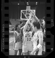 Basketball players Kalen Wright, Paula Pyers, Melissa Ward and teammates rejoicing after qualifying for Final Four, Calif., 1986