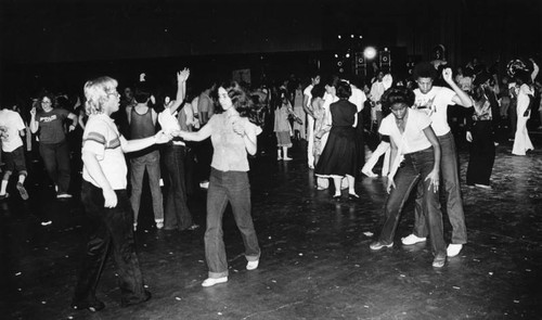 Unidentified dancers boogie the night away