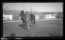 Al Kearney, in suit, with horse