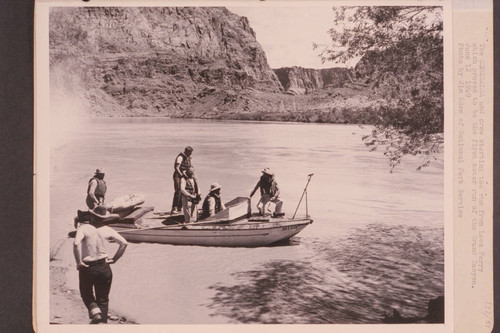The "Esmeralda" [II] and crew starting the run from Lees Ferry which proved to be the first motor run of the Grand Canyon. Owen Clark at left with back to camera. Bestor Robinson; Edward Hudson; Willie Taylor; Ed Hudson; Dock Marston
