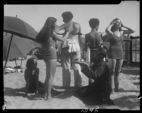 Young women preparing for sunbathing, Santa Monica, circa 1930