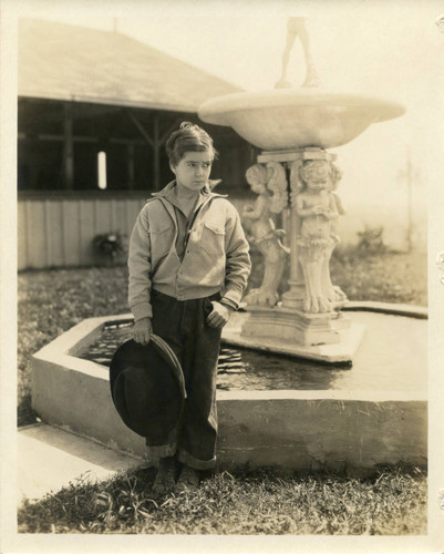 Publicity photo of Micky in cowboy attire