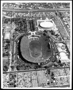 An aerial view of the Coliseum and Sports Arena, looking east