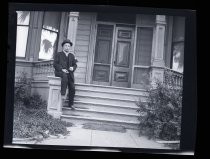 Portrait of man on front steps