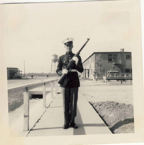 PFC Donald Larson in dress blue uniform at port arms, MCAS El Toro, 1947